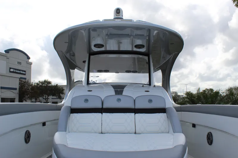 Slide: The Image of 2020 Mystic Powerboats M4200 with sleek seating and modern design. - 45