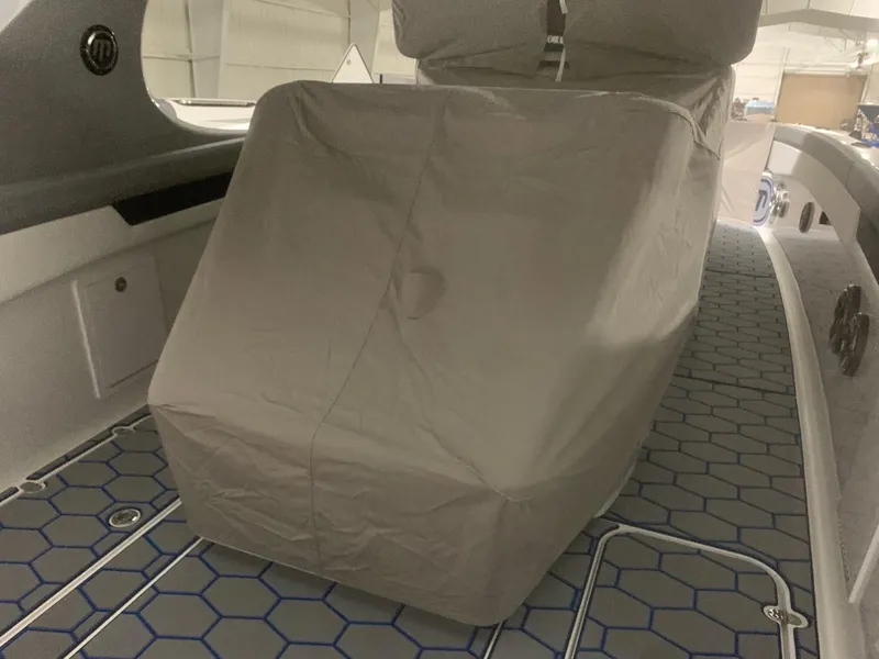 Slide: The Image of Covered seating area on 2020 Mystic Powerboats M4200 with hexagonal floor design. - 72