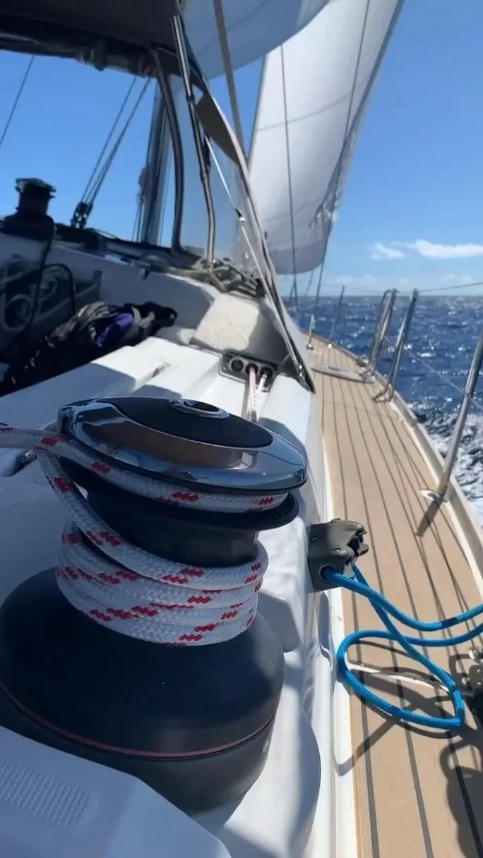 Slide: The Image of 2015 Jeanneau Sun Odyssey 469 sailing on open sea with clear skies. - 17