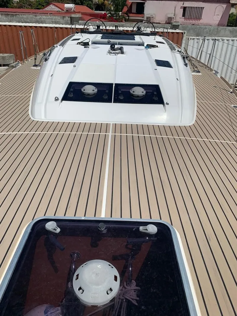 Slide: The Image of 2015 Jeanneau Sun Odyssey 469 yacht deck with sleek design and modern features. - 24