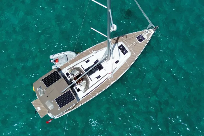 Slide: The Image of Aerial view of 2015 Jeanneau Sun Odyssey 469 sailboat on clear turquoise water. - 4