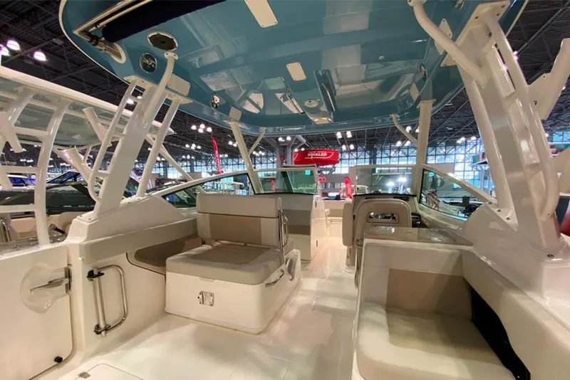 Slide: The Image of 2023 Boston Whaler 280 Vantage interior at a boat show. - 5