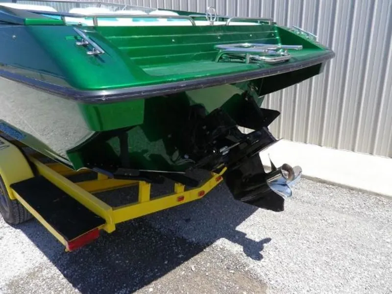 Slide: The Image of 1992 Formula Boats 27 on yellow trailer, rear view. - 3