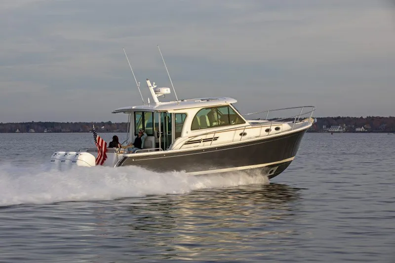 Slide: The Image of 2025 Back Cove 39O cruising on calm waters. - 5