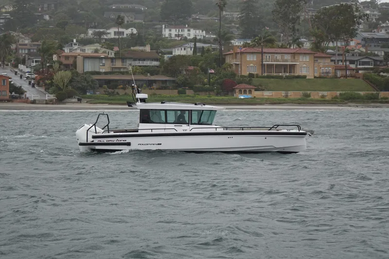 Slide: The Image of Axopar 28 Cabin 2022 - 2