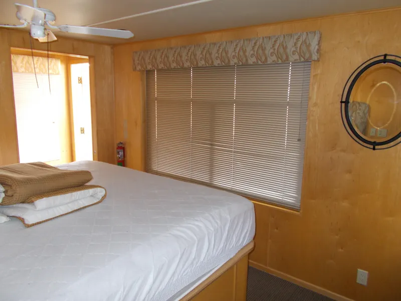 Slide: The Image of Bedroom interior of 2006 American Waterways Sapphire Skies 1/10 Ownership houseboat. - 12