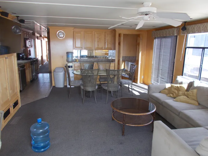 Slide: The Image of Interior of 2006 American Waterways Sapphire Skies houseboat with kitchen, dining area, and living room. - 28