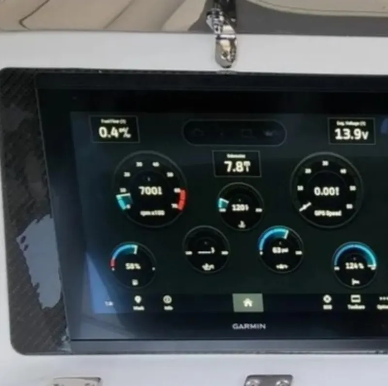 Slide: The Image of Garmin display on 2025 Walker Bay Venture boat showing engine and navigation metrics. - 5