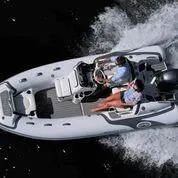 Slide: The Image of 2025 Walker Bay Venture boat cruising on water, top view. - 15