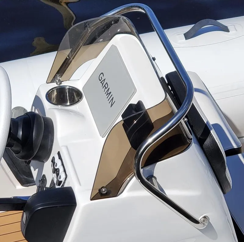 Slide: The Image of 2025 Walker Bay Venture boat console with Garmin navigation system. - 8