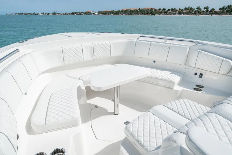 Slide: The Image of Luxurious seating area on the 2025 Pursuit S 378 boat with ocean view. - 7