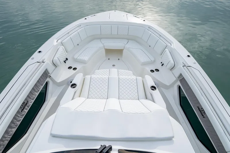 Slide: The Image of Luxurious seating area on the 2025 Pursuit S 378 boat. - 9