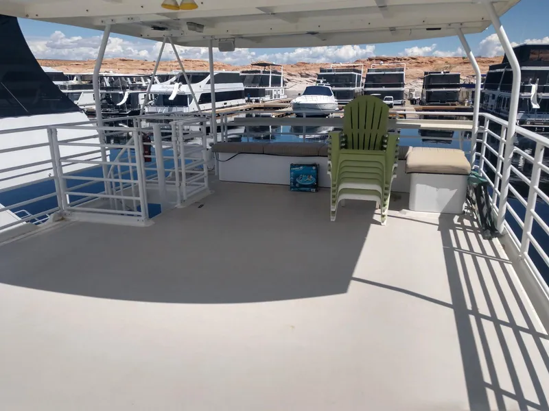 Slide: The Image of Upper deck of 2005 Twin Anchors Caspian #3 houseboat in marina. - 8