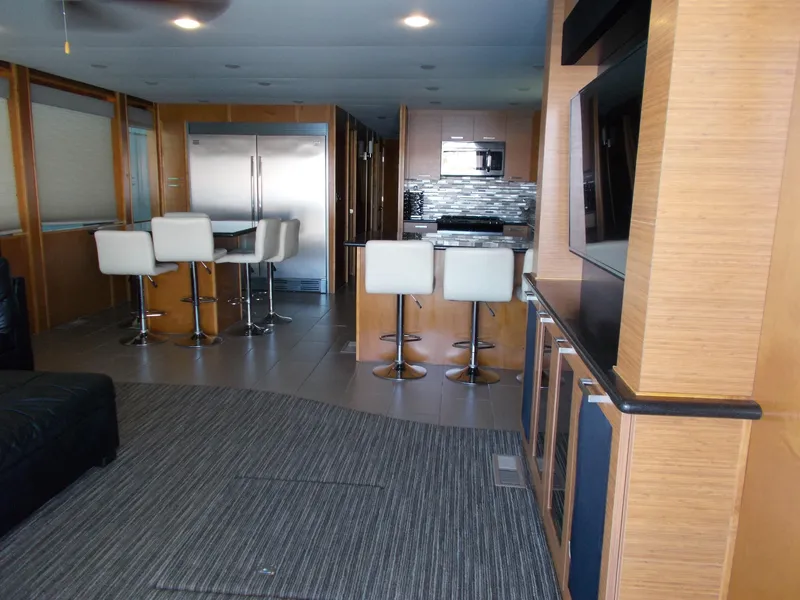 Slide: The Image of Modern kitchen and dining area in 2015 Bravada Intrepid Trip #1 houseboat. - 11