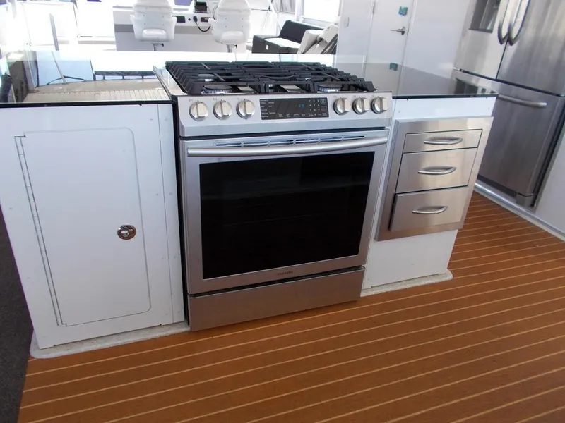 Slide: The Image of Modern kitchen with stainless steel stove and drawers on Bravada Intrepid Trip #1, 2015. - 7