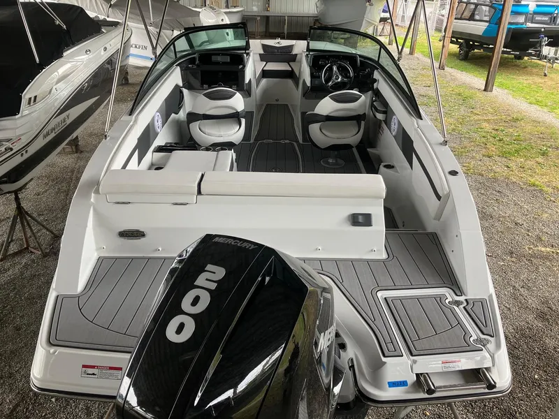 Slide: The Image of 2023 Monterey M-225 boat interior with 200 HP outboard motor. - 3