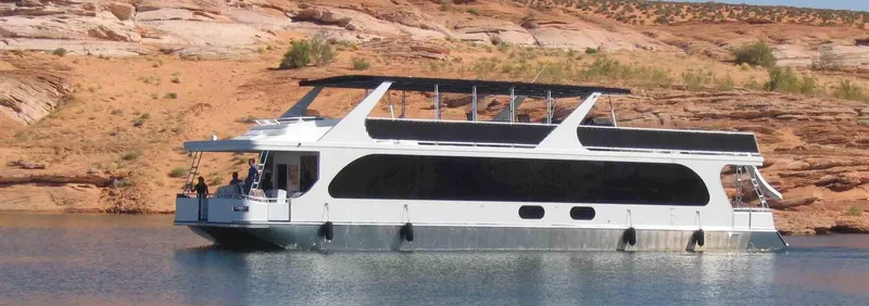 Slide: The Image of 2010 Bravada Dream Catcher Trip 14 houseboat on a scenic lake. - 0