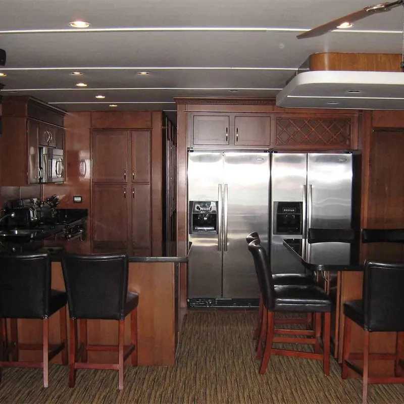 Slide: The Image of Modern kitchen in 2010 Bravada Dream Catcher Trip 14 houseboat with stainless steel appliances. - 1
