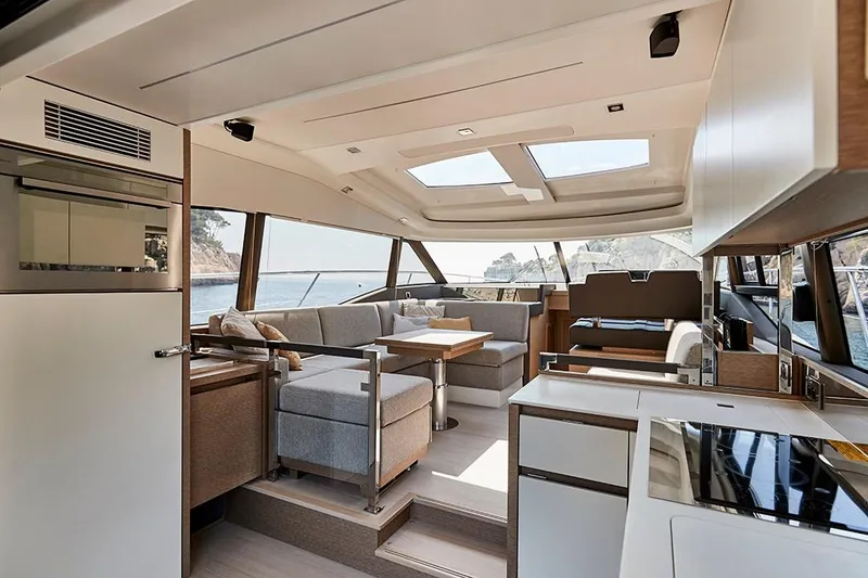 Slide: The Image of Luxurious interior of 2023 Prestige 460 S yacht with modern furnishings and panoramic windows. - 3