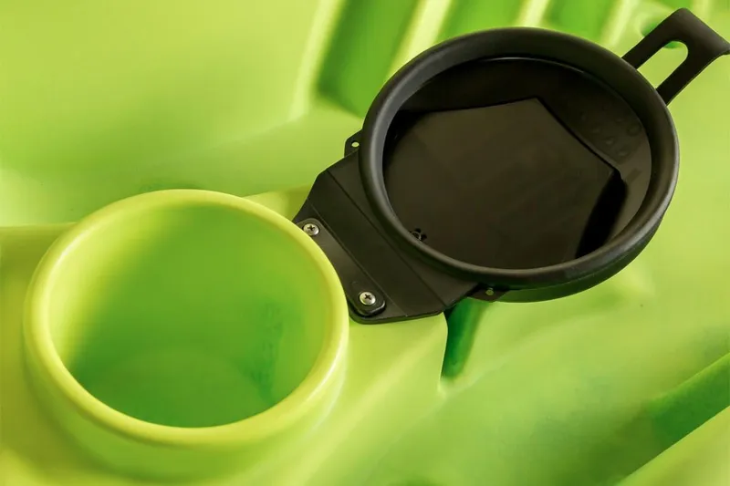 Slide: The Image of Close-up of Ocean Kayak Malibu 9.5 2023 model's storage compartment and cup holder. - 18