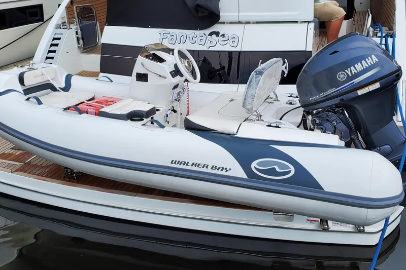Slide: The Image of 2025 Walker Bay Generation 11 LTE inflatable boat with Yamaha outboard motor. - 7