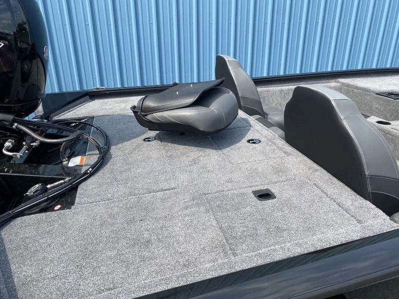 Slide: The Image of 2023 Tracker Pro Team™ 195 TXW boat interior with seating and storage. - 10