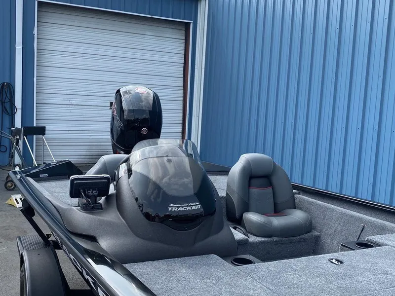 Slide: The Image of 2023 Tracker Pro Team™ 195 TXW fishing boat with outboard motor. - 11
