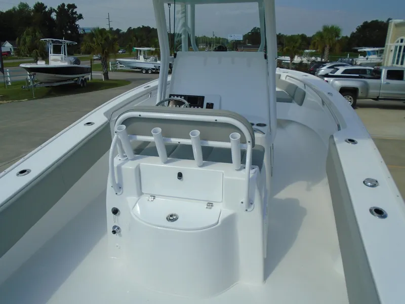 Slide: The Image of 2024 Cape Horn 27XS boat interior with rod holders and console. - 6