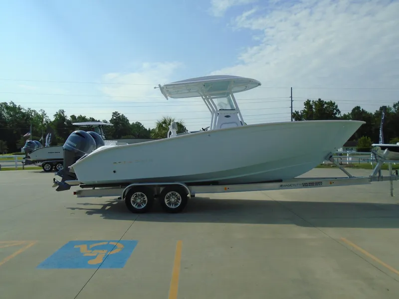 Slide: The Image of 2024 Cape Horn 27XS boat on a trailer in a parking lot. - 3