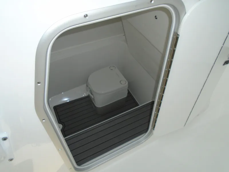 Slide: The Image of 2024 Cape Horn 27XS boat interior with compact marine toilet. - 8