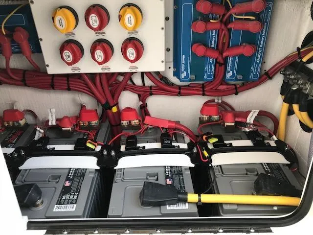 Slide: The Image of Electrical system of 2024 Invincible 36 boat with batteries and wiring. - 12