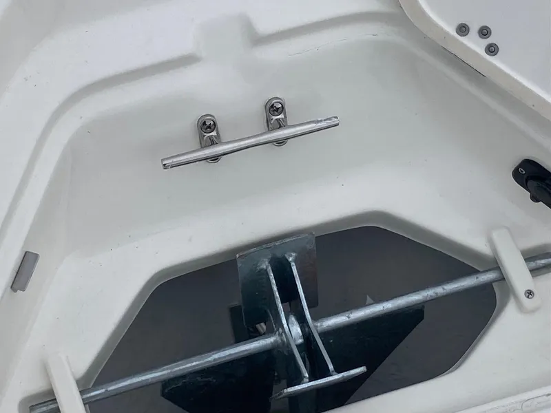 Slide: The Image of Anchor storage compartment of 2024 Key West 210 Bay Reef boat. - 15