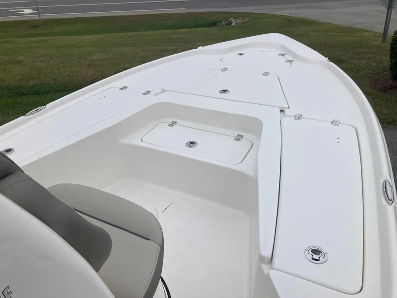 Slide: The Image of 2024 Key West 210 Bay Reef boat deck with storage compartments. - 7