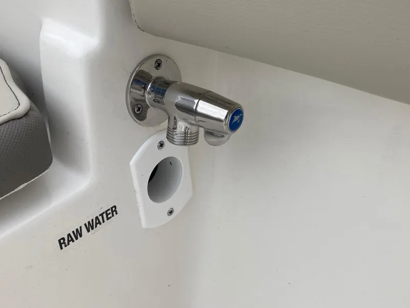 Slide: The Image of Raw water outlet on 2024 Key West 210 Bay Reef boat. - 14