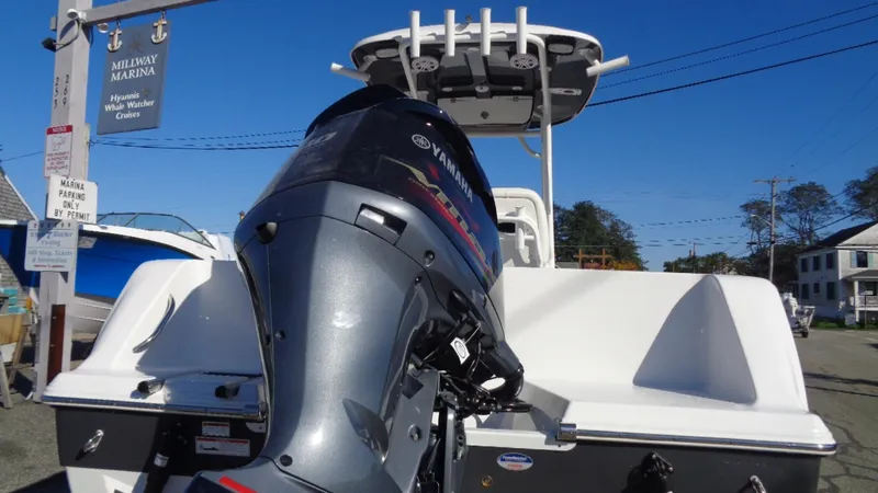 Slide: The Image of 2020 Sportsman 231 Heritage boat with Yamaha outboard motor at a marina. - 3