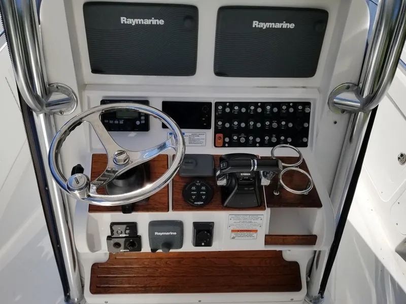 Slide: The Image of Control panel of a 2013 Southport 27 Center Console boat with Raymarine electronics. - 5