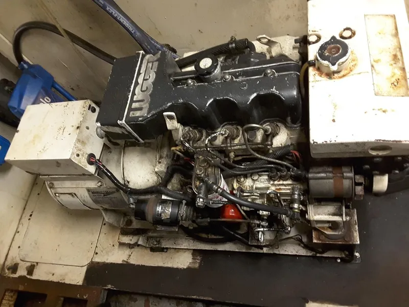 Slide: The Image of Engine room of 1971 Southern Marine MALAHIDE Pilothouse LRC, showcasing mechanical components. - 10
