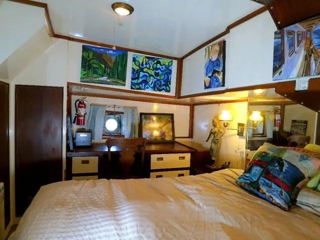 Slide: The Image of Cozy 1971 Southern Marine MALAHIDE Pilothouse LRC cabin with art, desk, and bed. - 26