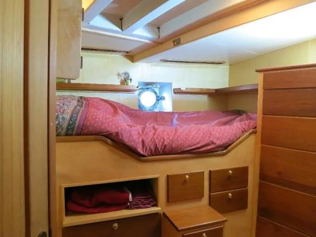 Slide: The Image of Cozy cabin interior of 1971 Southern Marine MALAHIDE Pilothouse LRC with wooden furnishings. - 27