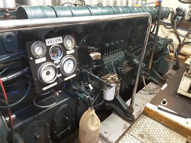 Slide: The Image of Engine room of 1971 Southern Marine MALAHIDE Pilothouse LRC with Kelvin gauges and controls. - 7