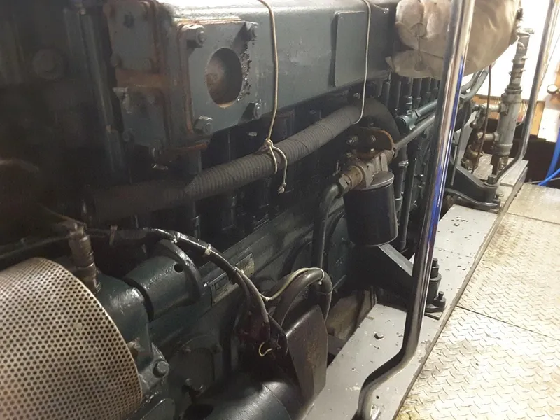 Slide: The Image of Engine room of 1971 Southern Marine MALAHIDE Pilothouse LRC, showcasing mechanical components. - 9