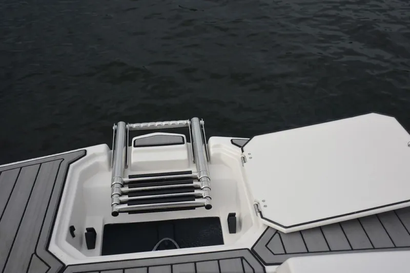 Slide: The Image of 2023 Starcraft 211 SVX boat swim platform with ladder. - 16