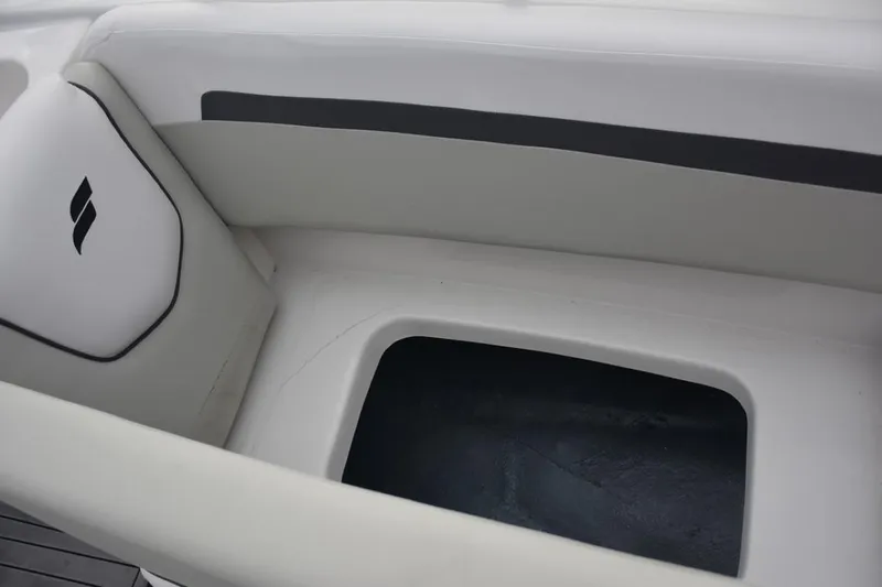 Slide: The Image of 2023 Starcraft 211 SVX boat interior storage compartment. - 8