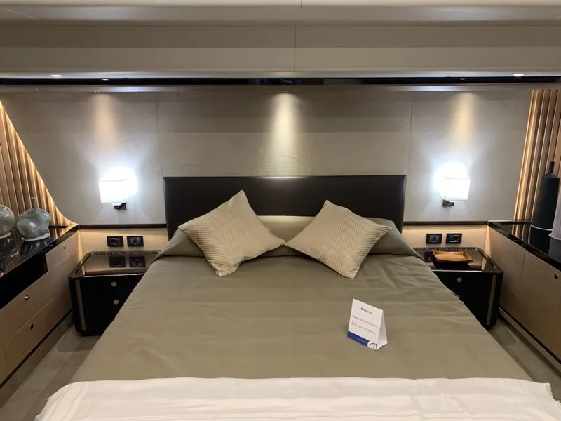 Slide: The Image of Luxurious bedroom interior of 2024 Absolute 58 Navetta yacht with modern lighting. - 23