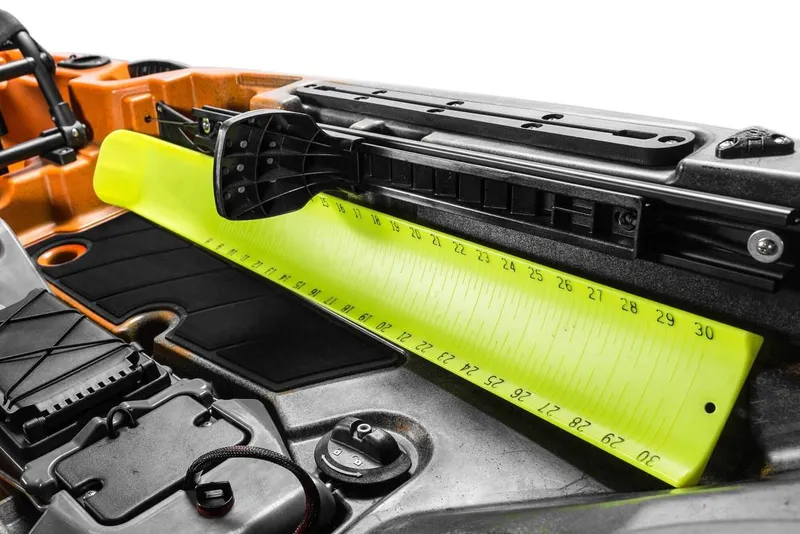 Slide: The Image of 2023 Old Town 106 Sportsman Minn Kota Power kayak with integrated measuring board. - 10