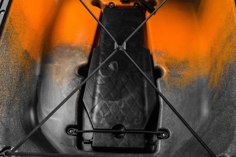 Slide: The Image of 2023 Old Town 106 Sportsman Minn Kota Power kayak interior with orange and black design. - 12