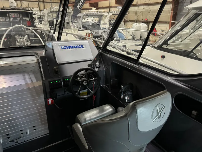 Slide: The Image of Helm Seating on the 2020 Extreme Boats 795 Walk Around - 11