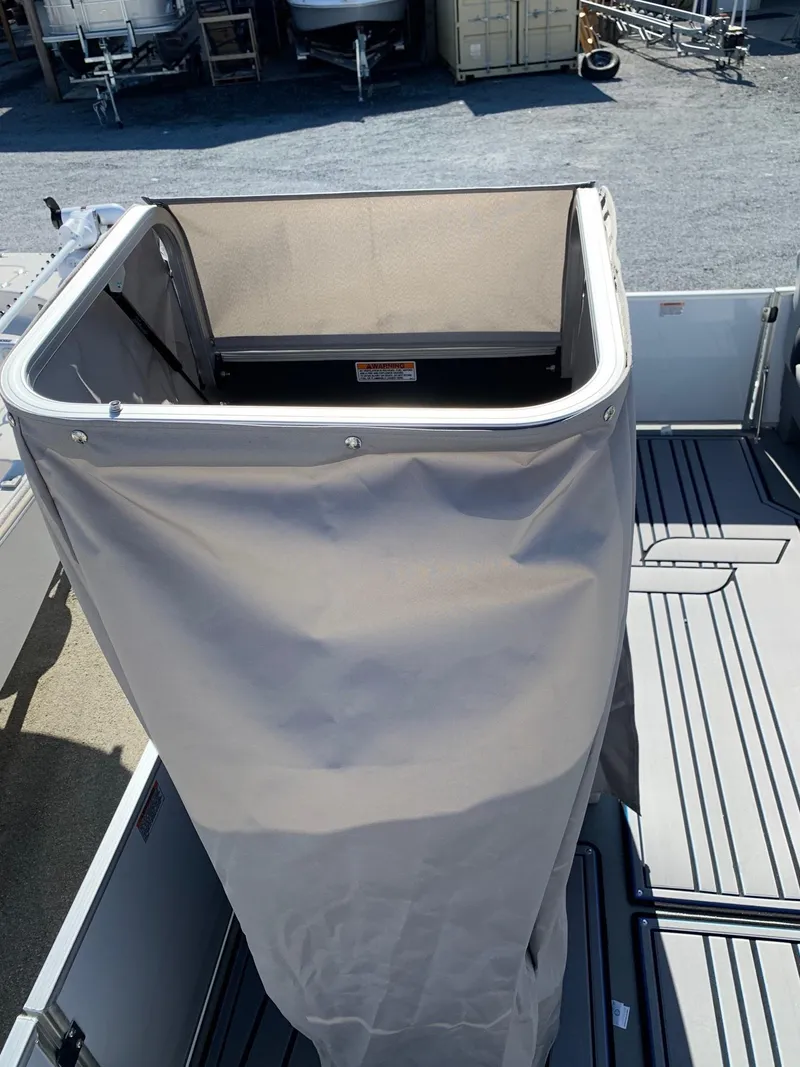 Slide: The Image of 2024 Starcraft SLS3 boat with privacy enclosure on deck. - 10