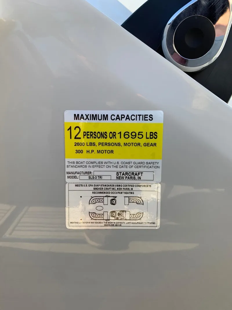 Slide: The Image of 2024 Starcraft SLS3 boat capacity label, 12 persons or 1695 lbs, 300 HP motor. - 15