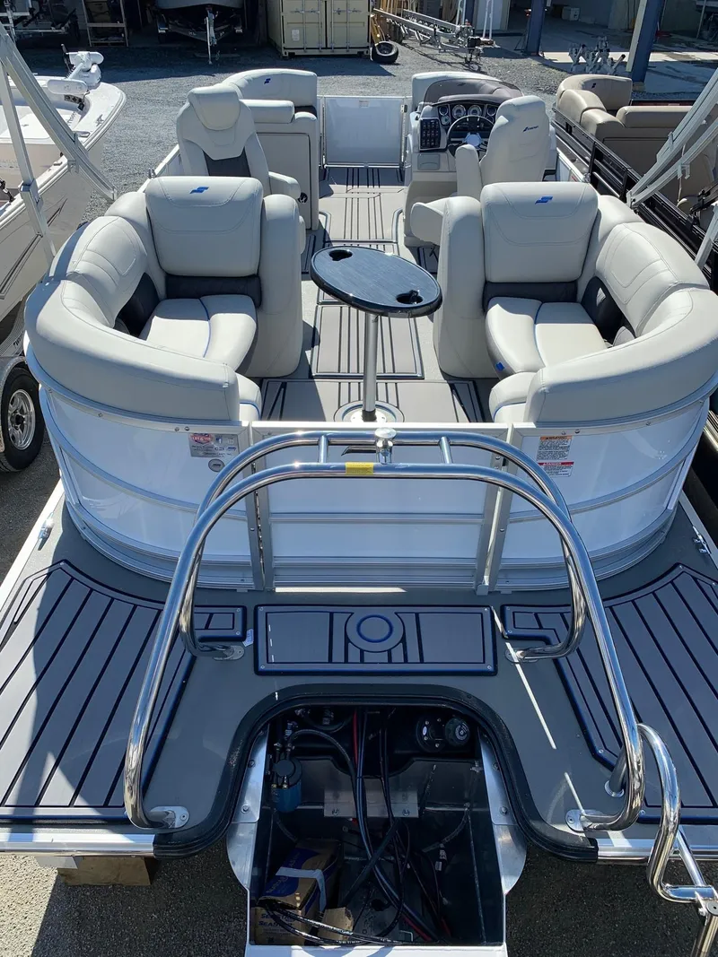 Slide: The Image of 2024 Starcraft SLS3 pontoon boat with luxurious seating and modern design. - 3